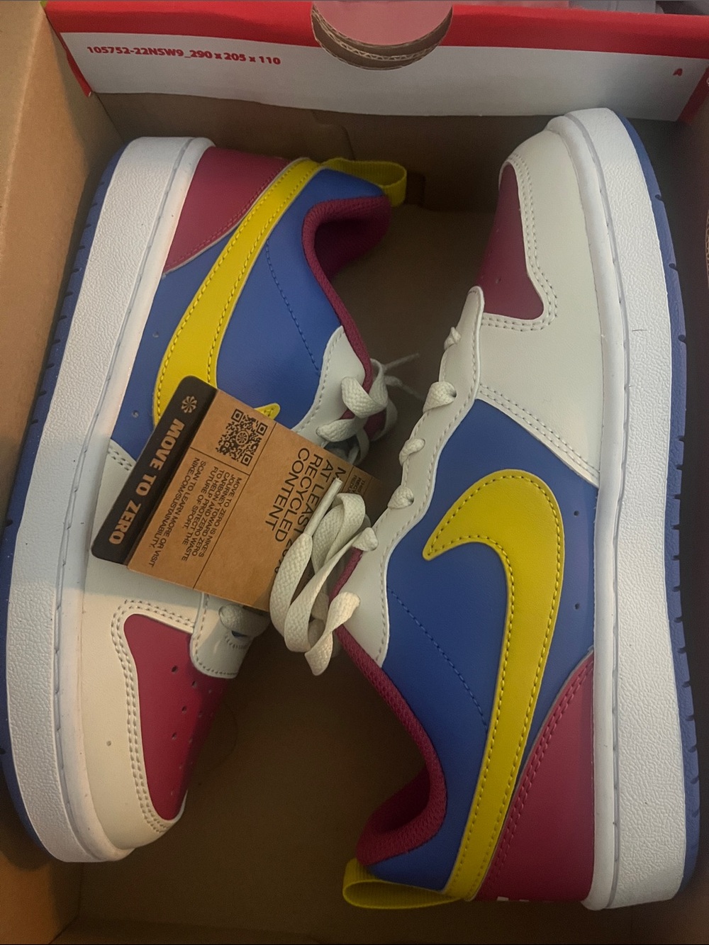 Nike Kids Low-Top Sneakers in White, Blue, Yellow and Pink